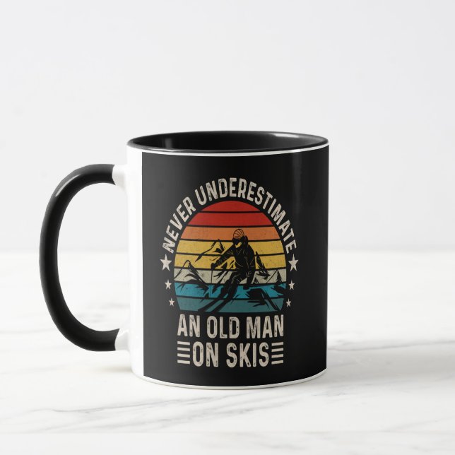 Never Underestimate An Old Man On Skis Retro Mug (Left)