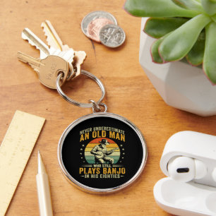 Never Underestimate An Old Man Plays Banjo Keychain