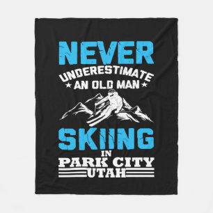 Never underestimate an old man skiing in Utah Fleece Blanket
