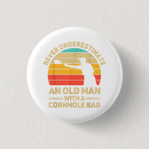Never Underestimate An Old Man With a Cornhole Bag 1 Inch Round Button