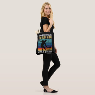 Never underestimate an old man with a pickleball tote bag