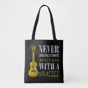 Never underestimate an old man with a ukuleleThis Tote Bag