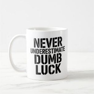 "Never Underestimate Dumb Luck" Saying Coffee Mug