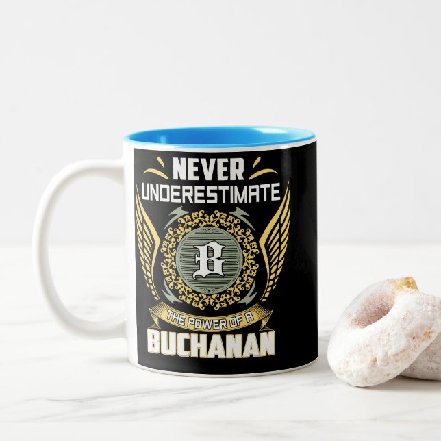 Never Underestimate The Power Of A Buchanan Two-Tone Coffee Mug (With Donut)