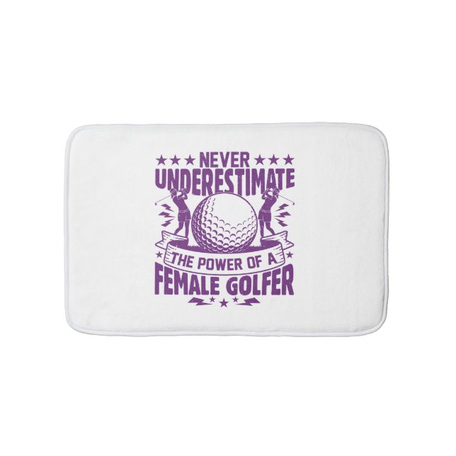 Never underestimate the power of a female golfer t bath mat (Front)