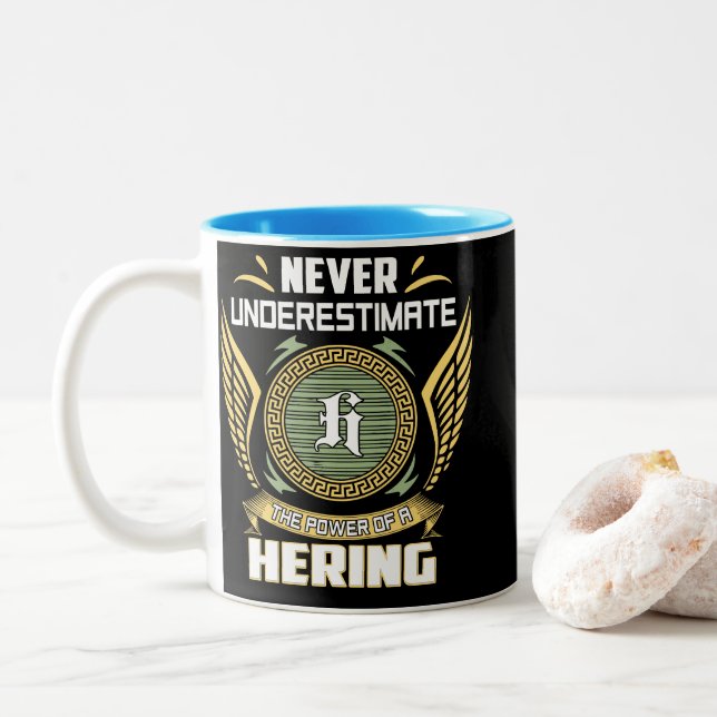 Never Underestimate The Power Of A Hering Two-Tone Coffee Mug (With Donut)