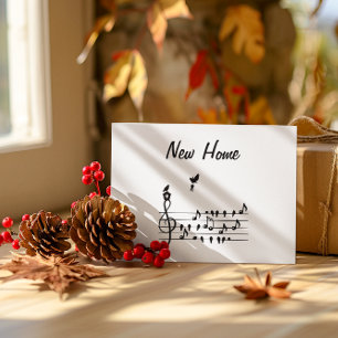 New home, song bird carrying key of new home save the date