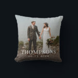 New Last Name Wedding Photo and Date Throw Pillow<br><div class="desc">Commemorate the new bride and groom with a custom throw pillow featuring a wedding photo, the new last name and wedding date on the front. The other side of the pillow has a charming tossed pattern of white doves, intertwined wedding rings and flowers on a slate blue grey background colour...</div>