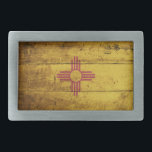 New Mexico State Flag on Old Wood Grain Belt Buckle<br><div class="desc">New Mexico State Flag on Old Wood Grain Feel free to modify the design according to your own preferences. You may change the design location, orientation, background colours and size. Also, you may add your own text, or slogan set its font, location and size, all in order to create the...</div>