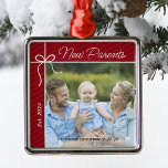 New Parents Family First Christmas Photo Metal Ornament<br><div class="desc">Celebrate your first year as parents with a heartfelt keepsake ornament! Personalize this charming Christmas tree decoration with a treasured photo of your new family, along with your baby's name and birth date. It's a beautiful way to capture this special milestone and create lasting memories for years to come. Perfect...</div>