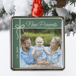 New Parents Family First Christmas Photo Metal Ornament<br><div class="desc">Celebrate your first year as parents with a heartfelt keepsake ornament! Personalize this charming Christmas tree decoration with your favourite photo of your new family, along with your baby's name and birth date. It's a beautiful way to capture this special milestone and create lasting memories for years to come. Perfect...</div>