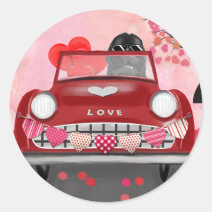 Newfoundland in car with hearts classic round sticker