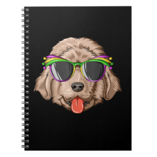 Newfoundland wearing glasses and mask present notebook