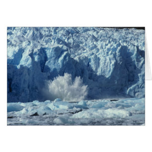 Newly-calved iceberg splashing into chilly