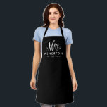 Newlywed bride Mrs personalized Apron<br><div class="desc">For the newlywed,  this black and white apron features "Mrs." in an elegant and modern script along with a last name and "established" date. Makes a cute bridal shower or bachelorette gift!</div>