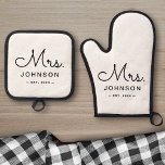Newlywed Bride Personalized White Oven Mitt & Pot Holder Set<br><div class="desc">For the bride and groom,  this black and white white oven mitt & pot holder features "Mrs." in a modern,  elegant script font along with a last name and established date. This is a perfect custom bridal shower or wedding gift!</div>