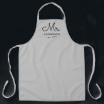 Newlywed Groom Personalized Grey Apron<br><div class="desc">For the bride and groom, this grey apron features "Mr." in a modern script font along with a last name and established date. This is a perfect bridal shower or wedding gift. These Mr. and Mrs. aprons are available in a variety of colours and can be also customized to match...</div>