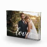 Newlywed Love Keepsake Wedding Photo Custom<br><div class="desc">Delight the newlyweds with a truly memorable gift—this Elegant Custom Wedding Photo Block featuring a stylish love script with long-tailed swashes. This chic and modern keepsake is designed to beautifully display their favourite wedding photo, creating a timeless piece they will cherish forever. Perfect for decorating their home with a touch...</div>