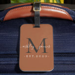 Newlywed Mr Mrs Black Monogram Names TerraCotta Luggage Tag<br><div class="desc">Chic, modern and simple monogrammed luggage tag with the text Mr and Mrs in white elegant handwritten script calligraphy on a terracotta background with your monogram in jet black. Simply add your married name, year established and monogram in stylish typography. Perfect luxury gift for the newlywed couple's wedding guests. Exclusively...</div>