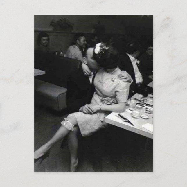 newlyweds kissing at a resturaunt postcard (Front)
