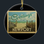 Newport Rhode Island Ornament Beach Vintage<br><div class="desc">This Greetings From Newport vintage postcard design features a sandy beach with a beautiful turquoise ocean water and above the sea,  a blue sky with billowy white clouds. In vintage travels style.</div>