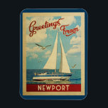 Newport Sailboat Vintage Travel Oregon Magnet<br><div class="desc">This Greetings From Newport Oregon vintage travel nautical design features a boat sailing on the water with seagulls and a blue sky filled with gorgeous puffy white clouds.</div>