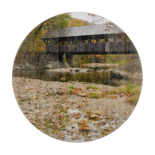 Newry Covered Bridge over river in autumn Cutting Board