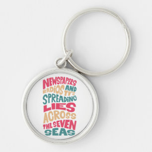 Newspapers radios and Tv´s spreading lies across t Keychain