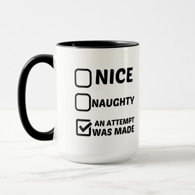 NICE NAUGHTY AN ATTEMPT WAS MADE MUG (Left)