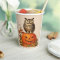 NIGHT OWL ON HALLOWEEN PUMPKIN AND AUTUMN LEAVES