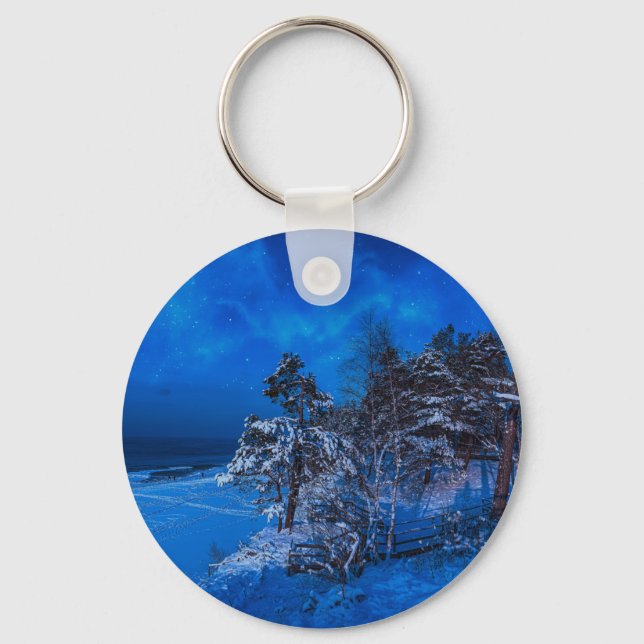 Nighttime winter scene with snow covered pines keychain (Front)