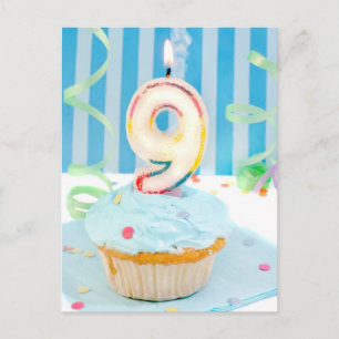 Ninth birthday candles on frosted cake in blue postcard