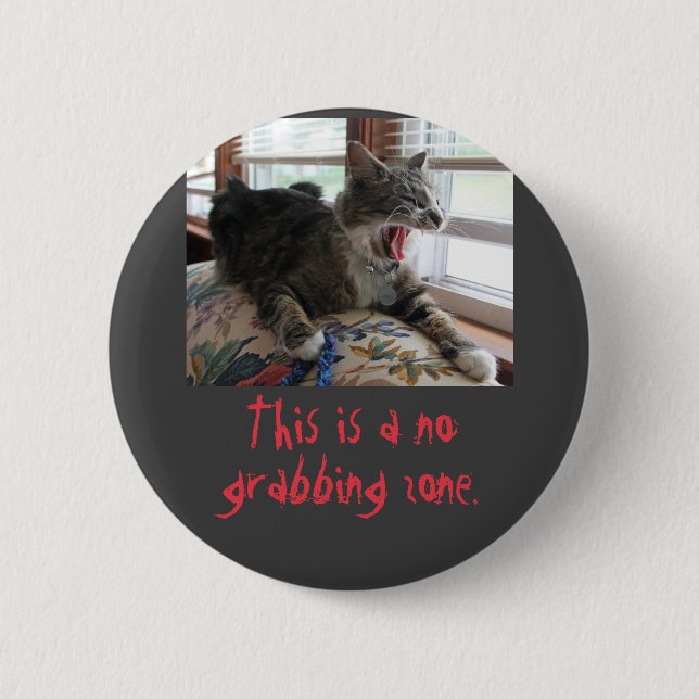 No grabbing zone 2 inch round button (Front)