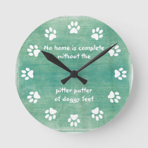 No home is complete-Paw Print-Teal Round Clock