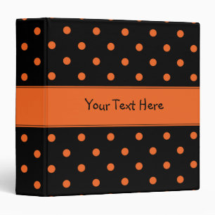 Noir avec le classeur orange de pois