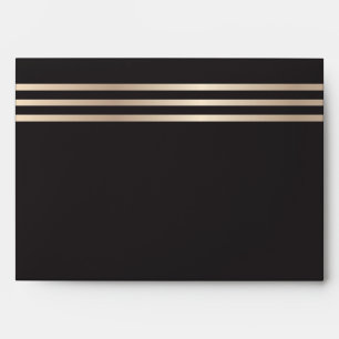 Noir et enveloppe rayée métallique d'or