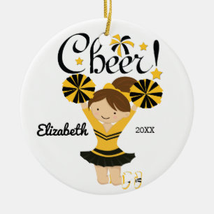 Noir et ornement de pom-pom girl de brune