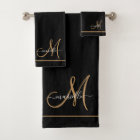 Nom élégant de monogramme noir en or