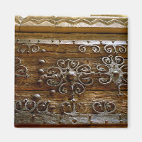 Norman iron scroll work on wooden door