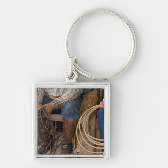 North America, USA. Cowboys relaxing and 2 Keychain (Front)