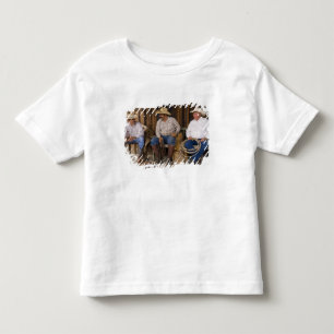 North America, USA. Cowboys relaxing and Toddler T-shirt