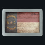 North Carolina State Flag on Old Wood Grain Rectangular Belt Buckle<br><div class="desc">North Carolina State Flag on Old Wood Grain Feel free to modify the design according to your own preferences. You may change the design location, orientation, background colours and size. Also, you may add your own text, or slogan set its font, location and size, all in order to create the...</div>