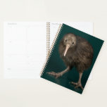 North Island Brown Kiwi Planner<br><div class="desc">This image shows a North Island Brown Kiwi, a flightless bird native to New Zealand. Feathers resembling a shaggy coat of brown hair cover the kiwi's body. The kiwi's long, curved, pale grey-brown bill is unique in the bird world in having the nostrils located near the tip. They smell their...</div>