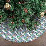 North Pole Snowman Dragon Penguin Christmas Brushed Polyester Tree Skirt<br><div class="desc">Step into a magical winter wonderland with this charming holiday illustration! Featuring a cheerful snowman and an adorable penguin holding festive Christmas gifts, this scene is made even more enchanting by a watchful green dragon resting protectively around them. A candy cane signpost pointing to the North Pole and softly falling...</div>