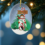 North Pole Snowman Dragon Penguin Christmas  Ceramic Ornament<br><div class="desc">A cute penguin is giving a green dragon a Christmas present at the north pole. A snowman with a North Pole candy cane sign in a backdrop of falling sign</div>