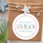 North Pole Special Delivery Cute First Christmas Classic Round Sticker<br><div class="desc">Personalized first Christmas stickers for baby from Santa. This cute design features whimsical typography, decorated with a penguin, giraffe, reindeer, bear, christmas birds, holly and string lights. The stickers are lettered stamp style, around the edge with "Special delivery from Santa .. North Pole Reindeer Express" and you can personalize the...</div>