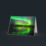 Northern lights mirrored on lake card<br><div class="desc">Intense northern lights (Aurora borealis) over Lake Laberge, Yukon Territory, Canada, with silhouettes of willows on lake shore.</div>