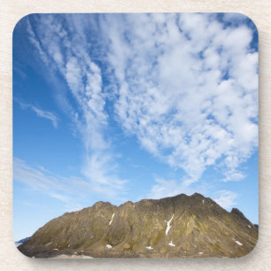Norway, Svalbard, Clouds above steep cliffs Coaster