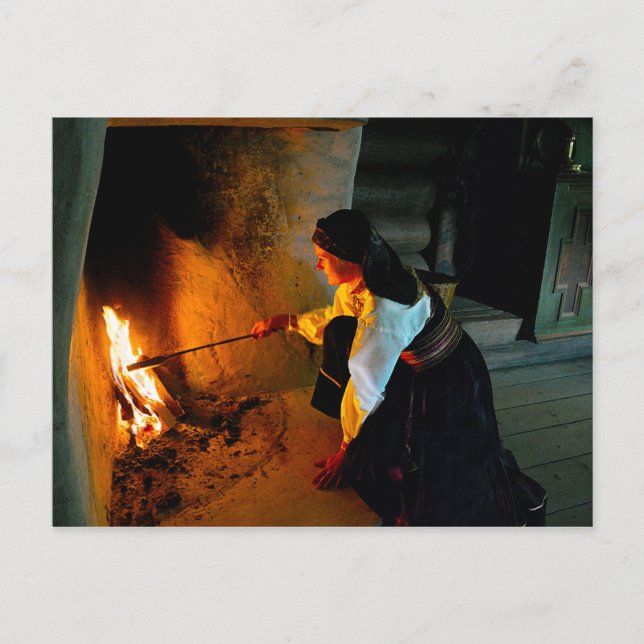 Norwegian Woman Tending the Hearth Fire Postcard (Front)