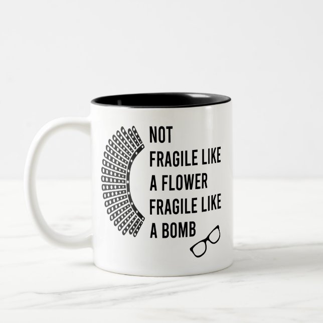 Not Fragile Like a Flower, Fragile Like a Bomb Two-Tone Coffee Mug (Left)